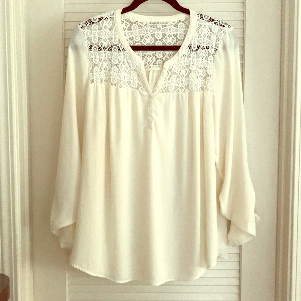 Cream crochet detailed top.